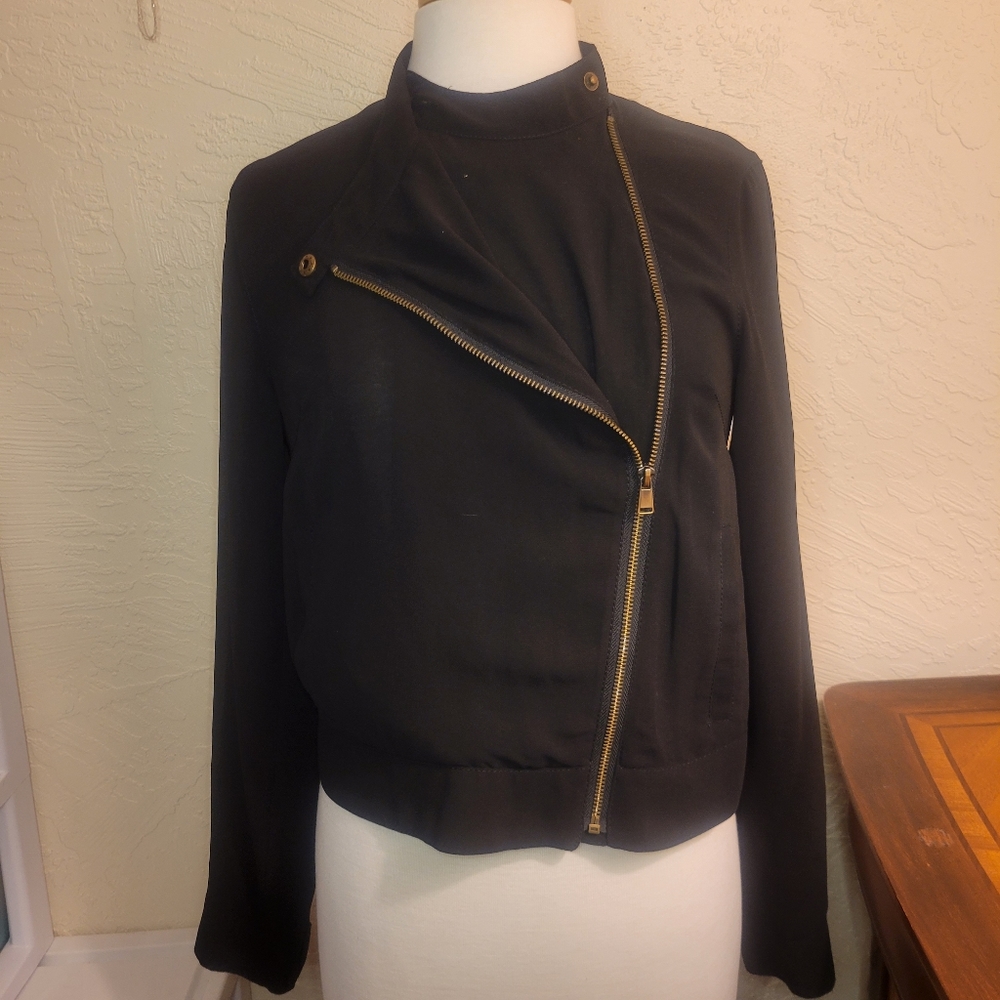 Rachel Roy black collarless biker jacket.
